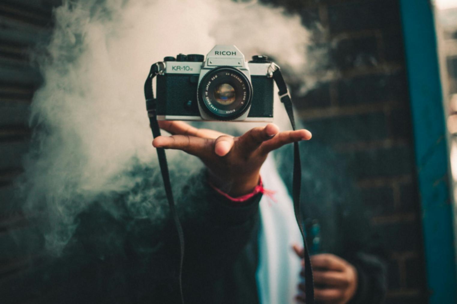Camera operator setting up a shot on location